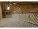 Unfinished loft area with wood flooring and a railing at 140 Moseley Dr, Stockbridge, GA 30281