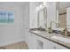 Bright bathroom with double vanity and granite countertop at 1081 Veltre Sw Cir, Atlanta, GA 30311