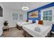 Serene bedroom with two twin beds and blue accent wall at 1081 Veltre Sw Cir, Atlanta, GA 30311