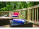 Relaxing deck with seating, and wooded backdrop at 1081 Veltre Sw Cir, Atlanta, GA 30311