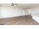 Spacious living room with hardwood floors and neutral wall colors at 435 Prescott Way, Villa Rica, GA 30180