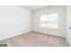 Simple bedroom with carpeted floors and window coverings at 445 Prescott Way, Villa Rica, GA 30180