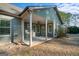 Covered patio with ceiling fan, great for outdoor entertaining at 8445 Nolandwood Ln, Villa Rica, GA 30180