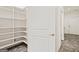 Bright, spacious corner pantry with ample shelving at 8445 Nolandwood Ln, Villa Rica, GA 30180