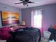 Bright bedroom with large bed and window at 112 Jennifer Sw Ln, Marietta, GA 30060