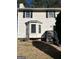 Two-story house with white siding, black shutters, and a deck at 112 Jennifer Sw Ln, Marietta, GA 30060