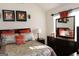 Bright bedroom with dark wood furniture and orange accents at 12298 Centerra Dr, Hampton, GA 30228