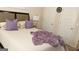 Bright bedroom with plush bedding and ample closet space at 12298 Centerra Dr, Hampton, GA 30228