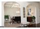 Formal dining room with dark wood table and seating for six at 12298 Centerra Dr, Hampton, GA 30228