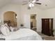 Main bedroom with a king-size bed and access to the bathroom and hallway at 12298 Centerra Dr, Hampton, GA 30228