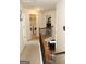 Upper hallway with laundry and access to bedrooms at 12298 Centerra Dr, Hampton, GA 30228