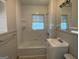 Bathroom with tub, shower and vanity at 5157 West Nw St, Covington, GA 30014