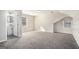 Bright bedroom with gray carpeting and an ensuite bathroom at 3199 Mcafee Rd, Decatur, GA 30032