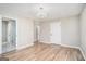 Large bedroom with hardwood floors and access to full bathroom at 3199 Mcafee Rd, Decatur, GA 30032