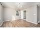 Bright bedroom with hardwood floors and en-suite bathroom access at 3199 Mcafee Rd, Decatur, GA 30032