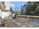 Wooden deck with railings, offering backyard access and treetop views at 3199 Mcafee Rd, Decatur, GA 30032