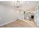 Open concept dining room with hardwood floors and views to kitchen at 3199 Mcafee Rd, Decatur, GA 30032