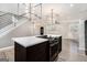 Modern kitchen with island, stainless steel appliances, and white quartz countertops at 3199 Mcafee Rd, Decatur, GA 30032