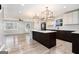 Modern kitchen with an island, stainless steel appliances, and open concept floorplan at 3199 Mcafee Rd, Decatur, GA 30032