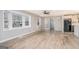 Hardwood floor living room, open concept kitchen, and French doors at 3199 Mcafee Rd, Decatur, GA 30032
