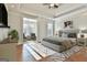 Main bedroom with hardwood floors and sitting area at 209 Gates Entry, Peachtree City, GA 30269