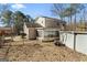 The home has a fenced backyard with an above ground pool and a screened in sunroom at 5427 Forest Pines Dr, Lithonia, GA 30058