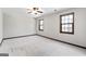 Bedroom featuring neutral walls, carpeted floor, and windows at 5427 Forest Pines Dr, Lithonia, GA 30058