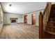 Cozy living room with fireplace and hardwood flooring at 5427 Forest Pines Dr, Lithonia, GA 30058