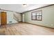 Living room showcasing hardwood floors, staircase, and natural light at 5427 Forest Pines Dr, Lithonia, GA 30058