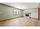 Living room featuring wood flooring and fireplace at 5427 Forest Pines Dr, Lithonia, GA 30058