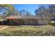 Backyard with patio and partial view of house at 5173 Kingswood Cir, Atlanta, GA 30349