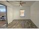 Empty bedroom with hardwood floors and new door at 5173 Kingswood Cir, Atlanta, GA 30349