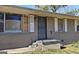 Front view of a brick ranch house with a covered entryway at 5173 Kingswood Cir, Atlanta, GA 30349