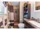 Clean bathroom with shower, granite vanity, and linen cabinet at 100 Traverse Ct, Atlanta, GA 30349