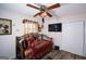 Bedroom with daybed, TV and ceiling fan at 100 Traverse Ct, College Park, GA 30349