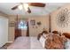 Main bedroom with a post bed, ceiling fan and large windows at 100 Traverse Ct, Atlanta, GA 30349