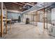 Unfinished basement with concrete flooring, exposed ceiling, and block walls at 255 Barnett Road Rd, Hampton, GA 30228