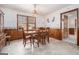 Bright dining room with wood paneling and chandelier at 255 Barnett Road Rd, Hampton, GA 30228