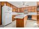 Kitchen features ample wood cabinetry at 255 Barnett Road Rd, Hampton, GA 30228