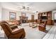 View of the carpeted living room and fireplace with built-ins at 255 Barnett Road Rd, Hampton, GA 30228