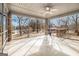 Screened porch overlooking a tranquil pond at 255 Barnett Road Rd, Hampton, GA 30228