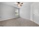 Well-lit bedroom with ceiling fan and window at 870 N Bethany Rd, Mcdonough, GA 30252