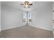 Spacious bedroom with carpet, neutral walls, and ceiling fan at 870 N Bethany Rd, Mcdonough, GA 30252