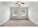 Spacious bedroom with neutral carpeting and ceiling fan at 870 N Bethany Rd, Mcdonough, GA 30252