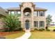 Two-story brick home with gray shutters and a grand entrance at 870 N Bethany Rd, Mcdonough, GA 30252