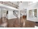 Two-story great room showcasing hardwood floors, staircase, and kitchen at 870 N Bethany Rd, Mcdonough, GA 30252