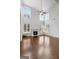 High-ceiling great room with hardwood floors, fireplace and wall of windows at 870 N Bethany Rd, Mcdonough, GA 30252