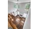 Upstairs view of the great room with hardwood floors and fireplace below at 870 N Bethany Rd, Mcdonough, GA 30252