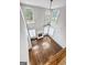 View of great room from above, showcasing hardwood floors and fireplace at 870 N Bethany Rd, Mcdonough, GA 30252