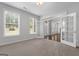 Home office with carpet, neutral walls, and french doors at 870 N Bethany Rd, Mcdonough, GA 30252